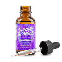 Sunday Scaries CBD Sleep Oil next to a pipette