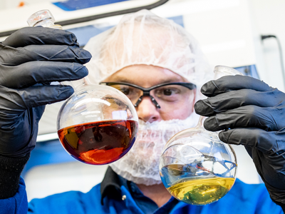 Sunday Scaries lab technician analyzing Full Spectrum vs. Broad Spectrum CBD oils