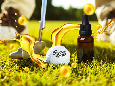 A golfer about to putt a ball with CBD for golf next to the golf ball