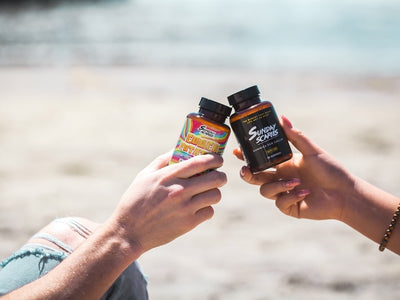 A bottle a Sunday Scaries clinks a bottle of Couch Potatoes showing CBD gummies vs. THC gummies