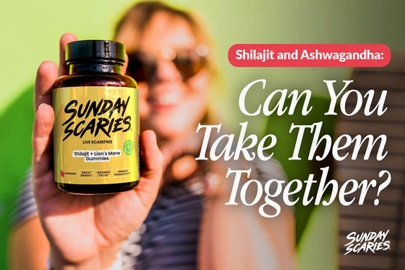 A woman with sunglasses on holds up a bottle of Sunday Scaries Shilajit gummies in front of a green background. 