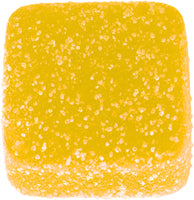 A yellow delta-9 square gummy with sugar coating