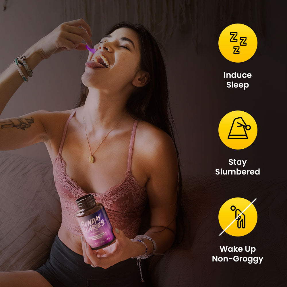 A woman in bed tilts her head back to eat a purple THC sleep gummy while holding the Sunday Scaries bottle