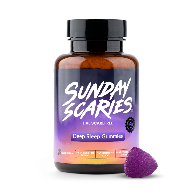 A bottle of Sunday Scaries 'Deep Sleep Gummies' with a purple and black label, shown alongside a single purple gummy candy on a clean white background.