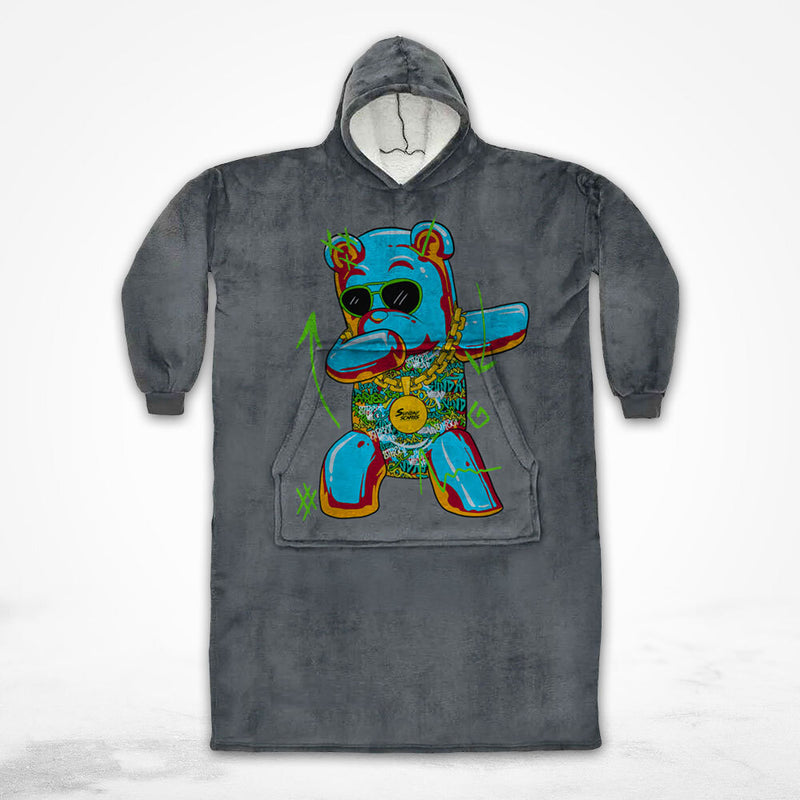 Our Sunday Scaries jacket worn as a blanket with a blue dabbing bear on it