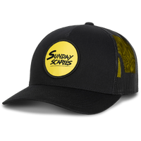 The Sunday Scaries Snapback has the yellow circle logo patch on the front with a 5 panel brim. 